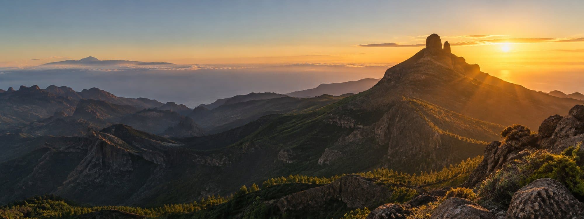 Roque Nublo o zachodzie słońca — symbol Gran Canarii